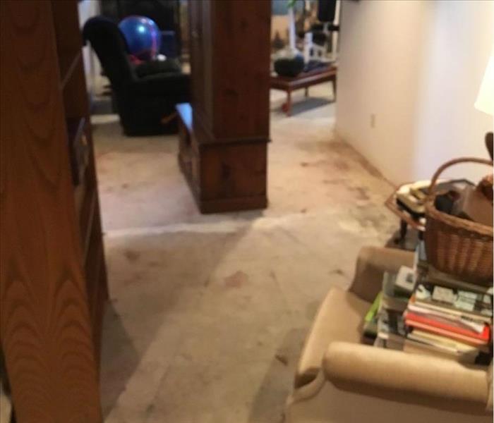 After SERVPRO pulled out affected carpeting.