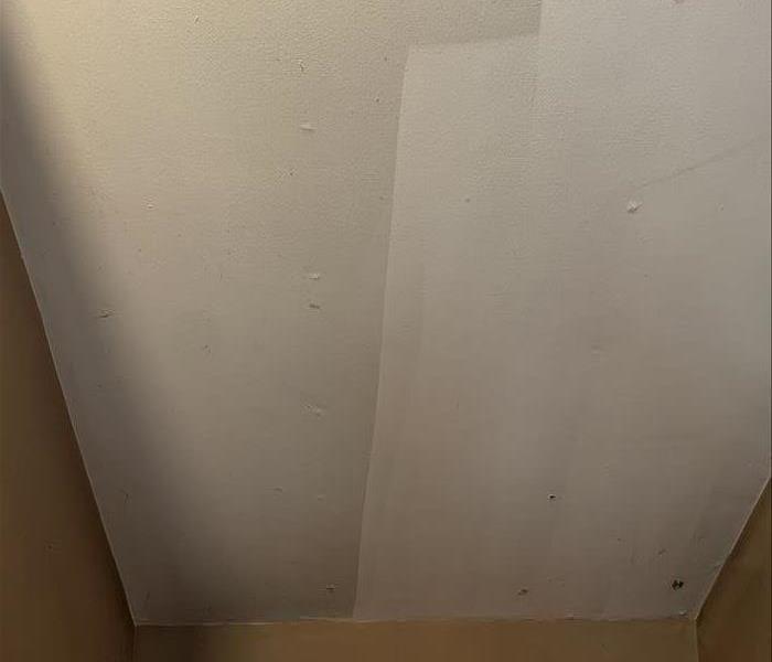 Soot stains on the ceiling.