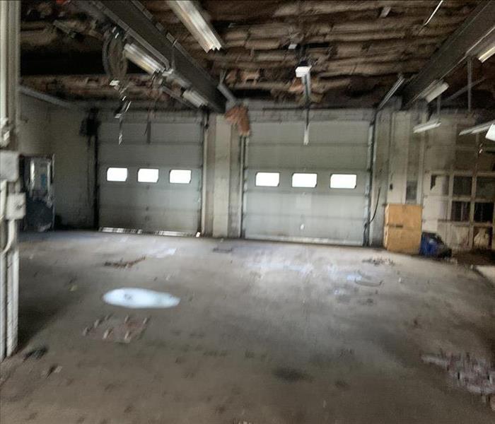 Empty commercial building before cleanup.